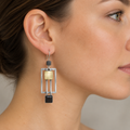 Model wearing a Pendulum earring based on the newly added product photo