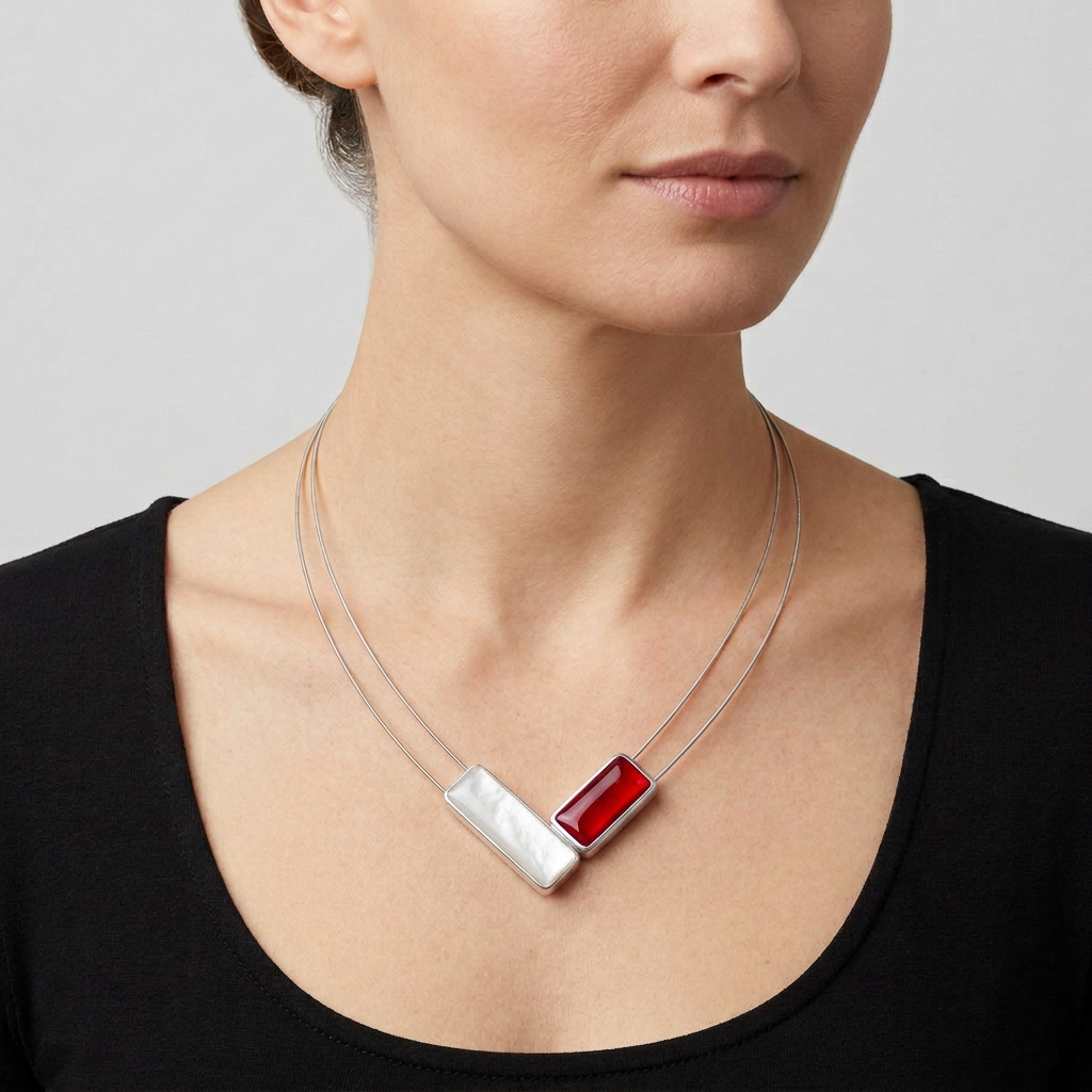 Model wearing the necklace with a richer red rectangle