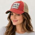 Woman wearing Drink Up Bitches cap