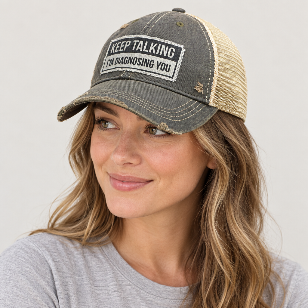 Woman wearing Keep Talking cap